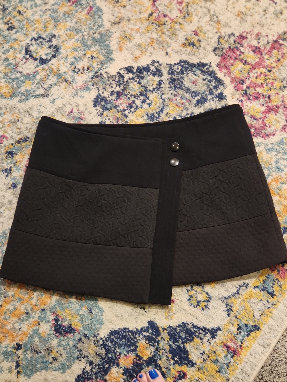 CAbi Black Panel Mini Skirt with Snap Detail
